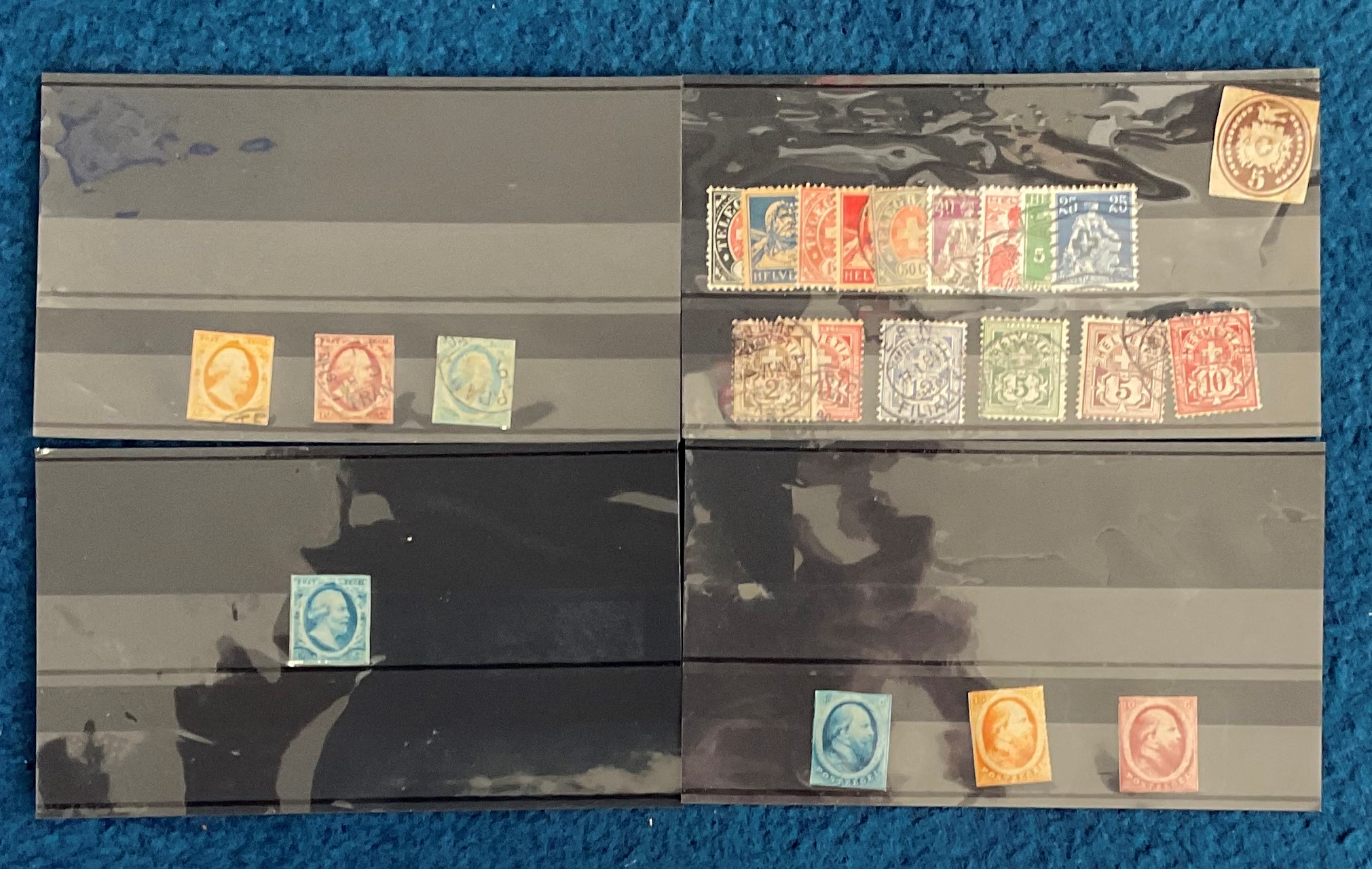 Dutch and Swiss stamp collection on various stockcards. 24 stamps. Good condition. We combine