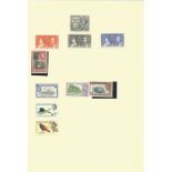 British Honduras and Cayman Islands, stamps on loose sheets, approx. 15. Good condition. We