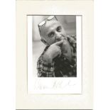 Actor Warren Mitchell signed black and white postcard mounted to a size of 7x5. Warren Mitchell