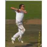 Graeme Swann signed 10x8 bowling cricket photo. Good condition. All autographs come with a