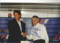 Sylvester Stallone and Bernie Eccleston signed 12x8 colour photo. Good condition. All autographs