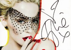 Kylie Minogue signed 6x4 inch colour photo card. Minogue is the highest selling female Australian
