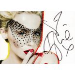 Kylie Minogue signed 6x4 inch colour photo card. Minogue is the highest selling female Australian