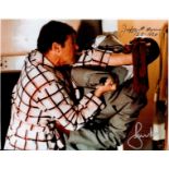 Roger Moore and Julius Harris signed 10x8 Live and Let Die colour photo. Good condition. All