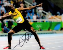 Usain Bolt signed 10x8 inch colour photo. Usain St. Leo Bolt, OJ, CD, OLY born 21 August 1986 is a