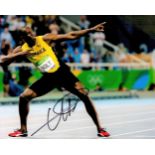 Usain Bolt signed 10x8 inch colour photo. Usain St. Leo Bolt, OJ, CD, OLY born 21 August 1986 is a