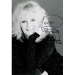 Petula Clark signed 10x8 inch black and white photo. Petula Sally Olwen Clark, CBE born 15
