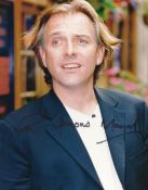 Rik Mayall signed 10x8 colour photo inscribed Rik "Famous" Mayall.