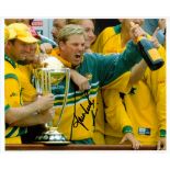 Cricket, Shane Warne signed 10x8 colour photograph pictured celebrating with the cricket World Cup.