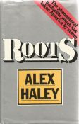 Alex Haley. Roots. A hardback book. Spine and dust jacket are showing very early signs of age. First