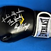 Boxing Julian Jackson and his son Clayton signed Everlast black glove. Signatures obtained at the