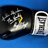 Boxing Julian Jackson and his son Clayton signed Everlast black glove. Signatures obtained at the