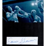 Boxing, Earnie Shavers signature piece featuring a black and white photo and a signed card mounted