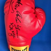 Boxing Mark Too Smooth Johnson, Antonio Tarver and Kevin Kelly multi signed Everlast red glove.