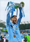 Football Ruben Dias signed 12x8 colour photo pictured celebrating with the Premier league trophy for