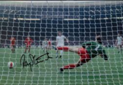 Football. West Ham's Ray Stewart Hand signed colour 12x8 photo. Photo shows Stewart sending the