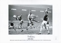 Football Cliff Jones signed 16x12 black and white print. Welch Wizard in typical action against West