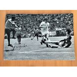 Football, Jairzinho signed 12x16 black and white photograph pictured during the 1970 World Cup match