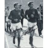 Football. Martin Peters and Geoff Hurst Signed 10x8 black and white photo. Photo shows the pair