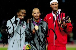 Olympics multi signed 6x4 colour photo All three medal winners 2012 mens 400m event includes Felix