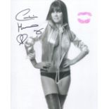 007 Bond girl Caroline Munro signed and physically kissed photo to leave a lipstick mark upon it.