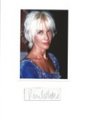 Paula Yates small signature piece below colour photo. Good condition. All autographs come with a