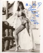 007 James Bond girl Caroline Munro signed sexy 8x10 photo. Good condition. All autographs come