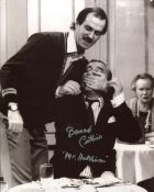 Fawlty Towers 8x10 comedy scene photo signed by actor Bernard Cribbins. Good condition. All