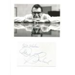 Dave Brubeck signature piece below black and white photo. Good condition. All autographs come with a