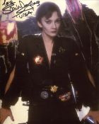 Superman II movie photo signed by actress Sarah Douglas as Ursa. Good condition. All autographs come