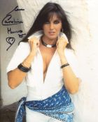 007 James Bond girl Caroline Munro signed sexy 8x10 photo. Good condition. All autographs come