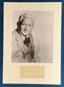 Spencer Tracy signature piece mounted below b/w photo. Approx overall size 14x11. Good condition.