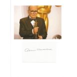 Ennio Morricone signature piece below colour photo. Good condition. All autographs come with a