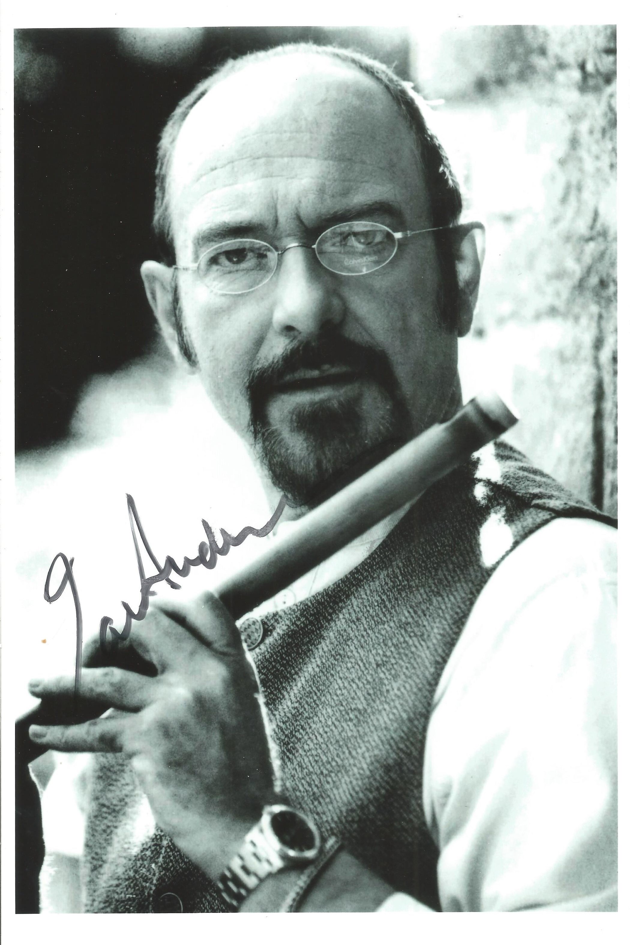 Ian Anderson signed 12x9 black and white Jethro Tull photo. Good condition. All autographs come with