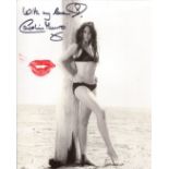 007 Bond girl Caroline Munro signed and physically kissed photo to leave a lipstick mark upon it.