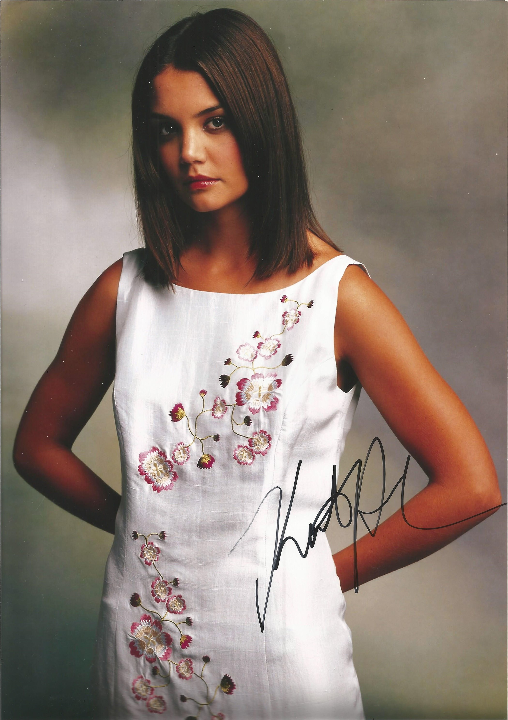 Katie Holmes signed 12x8 colour photo. American actress, director and producer. She first achieved