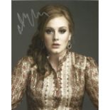 Adele signed 10 x 8 inch colour photo. English singer and songwriter. She is one of the world's