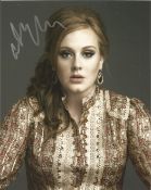 Adele signed 10 x 8 inch colour photo. English singer and songwriter. She is one of the world's