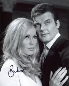 Roger Moore signed 8x10 photo from The Saint. Good condition. All autographs come with a Certificate