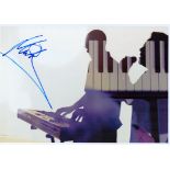 Musician Mickey Virtue from the band UB40 signed 12x8 colour image. Keyboard player Mickey joined