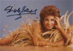 Shirley Bassey signed 7x5 colour photo. Welsh singer. Good condition. All autographs come with a