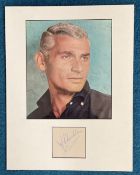 Jeff Chandler signature piece mounted below colour photo. Approx overall size 13x11. Good condition.