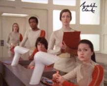 Space 1999 photo signed by actress Melita Clarke. Good condition. All autographs come with a