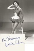 Leslie Caron signed white card, dedicated with 10 x 8 inch unsigned photo. Good condition. All