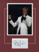 Barry Manilow display, the autograph of Barry Manilow set below a photo of him, double mounted