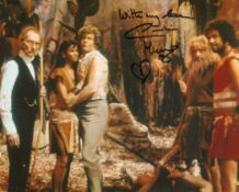 At The Earth's Core sci-fi movie photo signed by actress Caroline Munro. Good condition. All