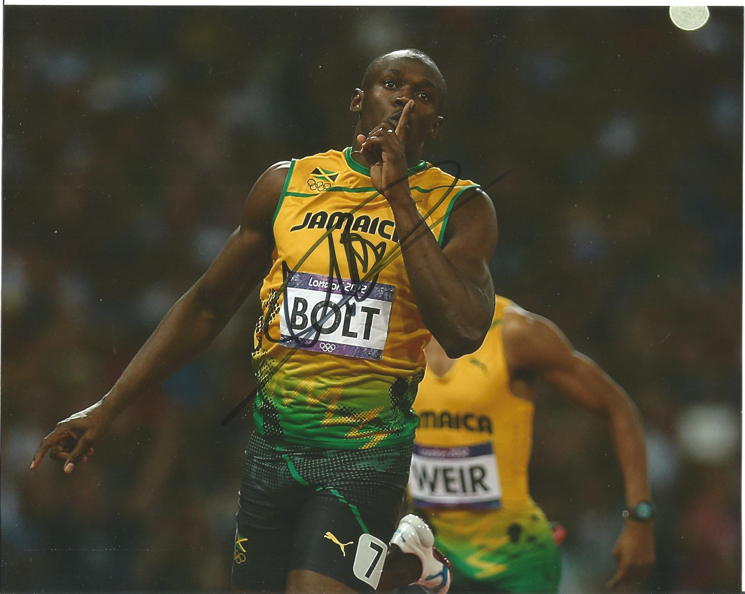 Usain Bolt signed 10x8 colour photo pictured in action in London 2012 Olympics. Jamaican sprinter,