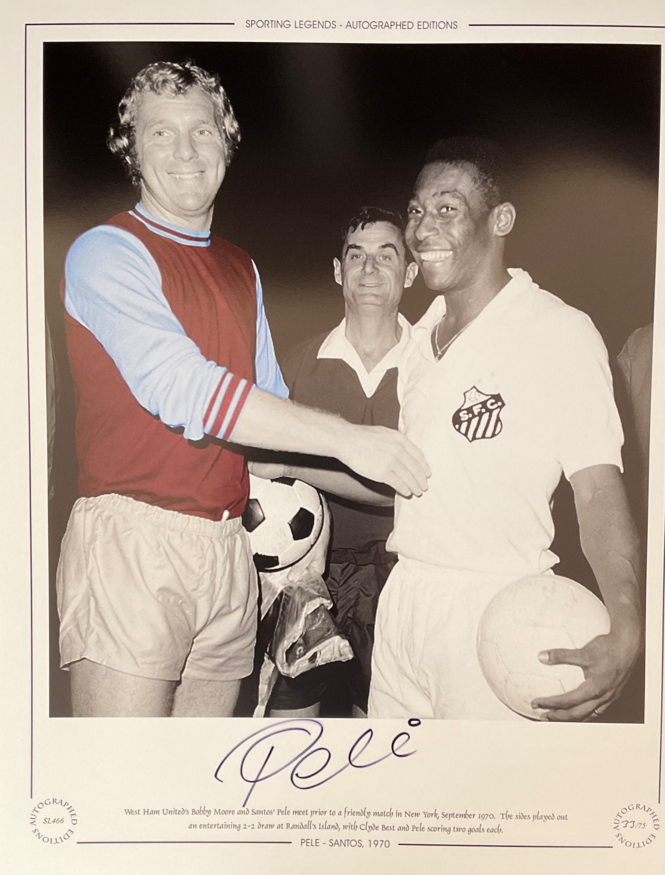 Football. Pele Signed 16 x 12 inch colourized photo, shows Pele with Bobby Moore. Superb item one of