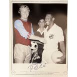 Football. Pele Signed 16 x 12 inch colourized photo, shows Pele with Bobby Moore. Superb item one of
