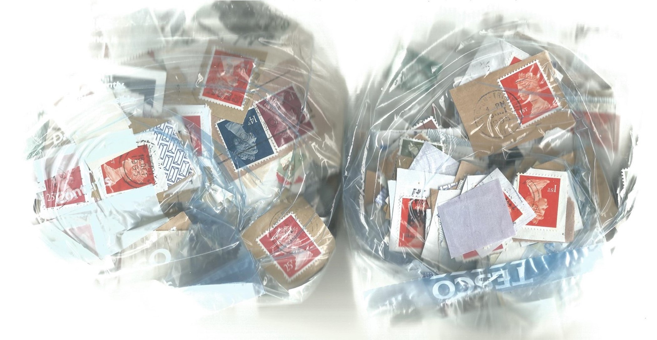 GB used Stamps; Two freezer bags full of mostly GB Stamps contains an estimated 1500 2000 GB Stamps.